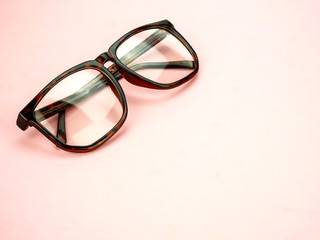 eye glasses on pink background