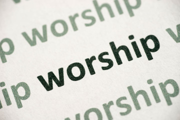 word worship printed on paper macro