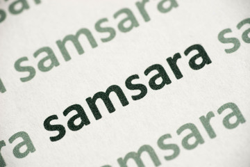 word samsara printed on paper macro