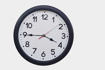 Time concept with black clock at a quarter to four am or pm
