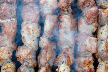 Barbecue skewers with meat on the brazier. Pork shish kebab