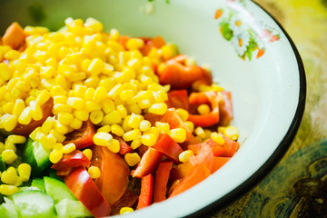 Fresh summer salad in bowl. Selective focus.