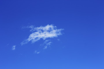 Idyllic white cloud on blue sky. Cloudscape background with fluffy cloud on blue summer sky wallpaper texture