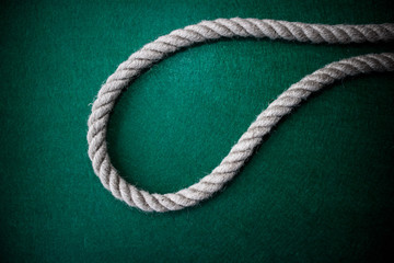 Rope on colorful green background