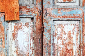 The surface of Rusty old wooden door