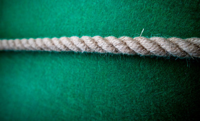 Rope on colorful green background