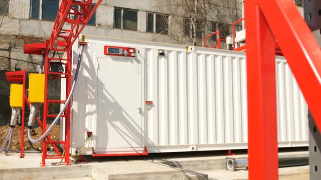 motion past mining farm equipped in container against plant