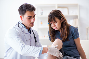 Patient visiting doctor after sustaining sports injury