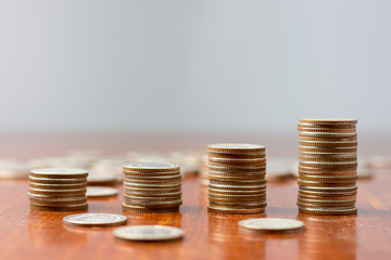 Close up Sort the coins on the table..