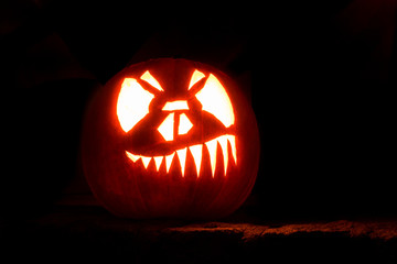 halloween pumpkin with horror face