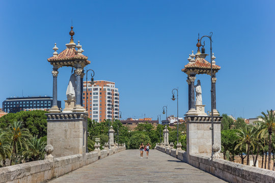 People walking the Puente del Mar bridge in Valencia, Spain