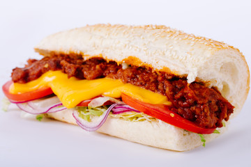 Sandwich with chilly meat cheese and vegetables 