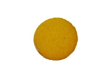 Tasty yellow macaroon isolated on white background
