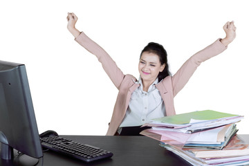 Successful asian businesswoman with clenched fists