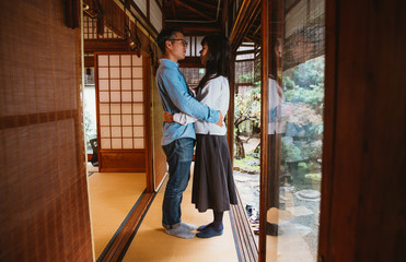 Fototapeta premium Young japanese couple spending time in their house