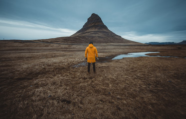Man exploring icelandic lands