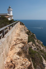 Fototapeta na wymiar Lighthouse Far de Cap Blanc on Mallorca 