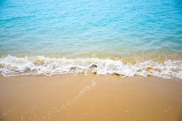 Nature in twilight period which including of sunrise over the sea and the nice beach. Summer beach with blue water and purple sky at the sunset.
