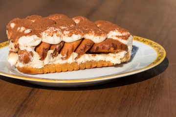 Traditional italian dessert tiramisu on a table