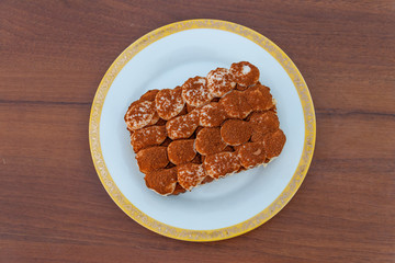 Traditional italian dessert tiramisu on a table
