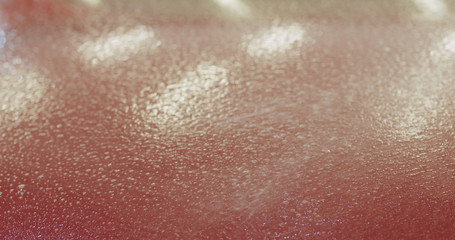 Fototapeta premium closeup of spaying soapy water on car before applying protective film