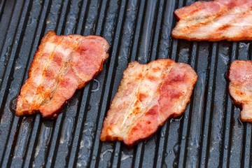 Meat on an electric grill. Home cooking. Healthy barbecue. Catering to friends. Electric grilling.