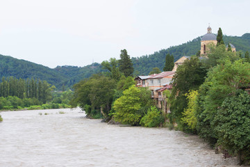 Fototapeta na wymiar the church along the Po River Rioni in the Kutaisi city
