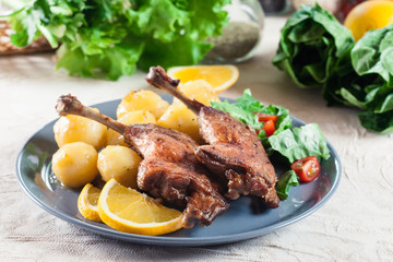 Duck legs confit with boiled potatoes