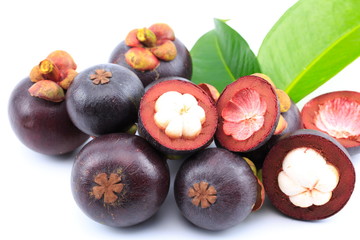 Fresh mangosteens on white background, isolated. Mangosteen, queen of fruits. Tropical fresh fruit.