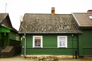 Old village wooden house in Trakai, Lithuania.Trakai is a town in southeastern Lithuania, west of Vilnius, the capital. Part of the Trakai Historical National Park. old houses in Trakai village 