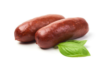Grill sausages with basil herb, isolated on white background.
