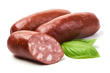 Smoked sausages for grill with basil herb, isolated on white background.