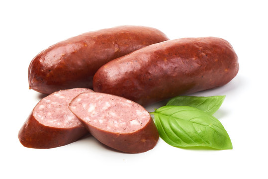 Grill sausages with basil herb, isolated on white background.