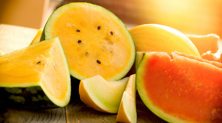 Fototapeta na wymiar Watermelon, cantaloupe (melon) - sweet, juicy and refreshing fruit in warm summer days