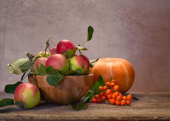 still life apples with leaves in a Cup with Rowan autumn harvest nature fruit vitamins