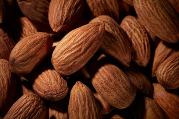 Organic texture of almonds. View from above. Almond. Almonds macro. Almonds background. Almond nuts.