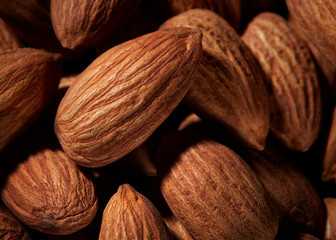 Organic texture of almonds. View from above. Almond. Almonds macro. Almonds background. Almond nuts.