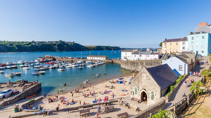 Panoroma of Tenby on a hot summer day, Wales, UK. A picturesque and colorful village on the coast...
