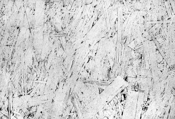 Grunge texture of oriented strand board, OSB, white background from pressed wooden panel.