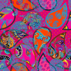 Seamless background pattern. Patchwork pattern with Paisley ornament patterns. Bright magenta and orange colors. Ethnic indian style.