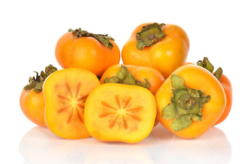 fresh ripe persimmons isolated on white background
