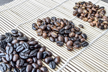 Roasted coffee beans of three different level in black bow on grunge wooden background,Coffee bean 3 level roast