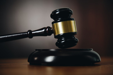 Gavel on wooden table
