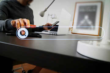 businessman working with smart phone and digital tablet and laptop computer in modern office