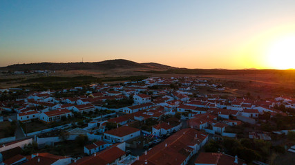 Aerial view of a landsacape with village in Alentejo at the sunset. Portugal. Drone photo
