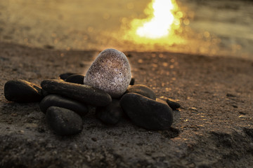 sunset and stones on the sea