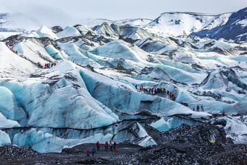Private guide and group of hiker walking on glacier at Solheimajokull - 218599923