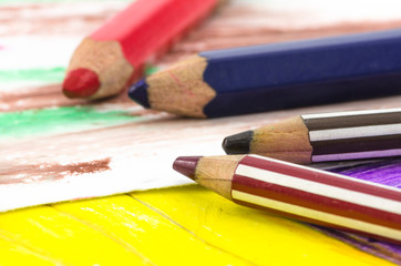 Simple children drawing with color pencil laying, colorful background. Back to school.