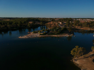 Fototapeta na wymiar Aerial view from a lake in Portugal. Minas de Sao Domingos, Alentejo, Portugal