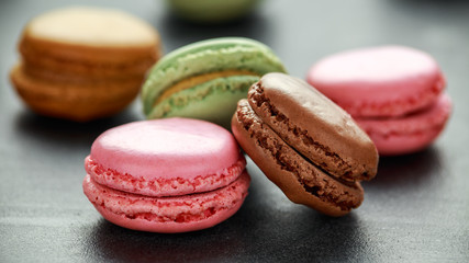Sweet colorful macarons dessert, almond cake, cookies. selected focus.